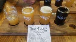Photos of Lost Province Brewing: Beer Flight and Front of Building